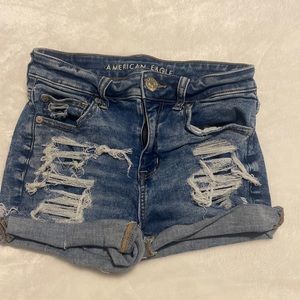 jean shorts , rips in front , always did me good!! love them. just growing out